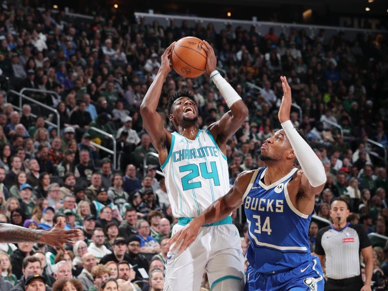 MILWAUKEE, WI - NOVEMBER 23: Brandon Miller #24 of the Charlotte Hornets drives to the basket during the game against the Milwaukee Bucks on November 23, 2024 at the Fiserv Forum Center in Milwaukee, Wisconsin. NOTE TO USER: User expressly acknowledges and agrees that, by downloading and or using this Photograph, user is consenting to the terms and conditions of the Getty Images License Agreement. Mandatory Copyright Notice: Copyright 2023 NBAE (Photo by Gary Dineen/NBAE via Getty Images).