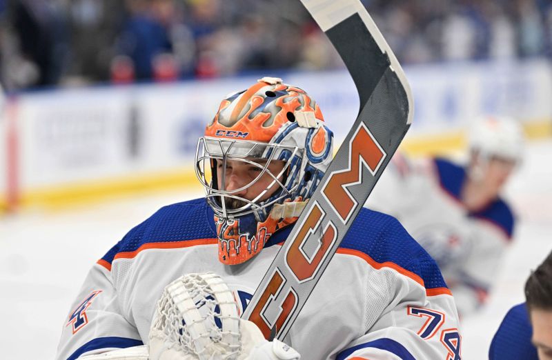 Mar 23, 2024; Toronto, Ontario, CAN; Edmonton Oilers goalie Stuart Skinner (74) warms up before playing the Toronto Maple Leafs at Scotiabank Arena. Mandatory Credit: Dan Hamilton-USA TODAY Sports