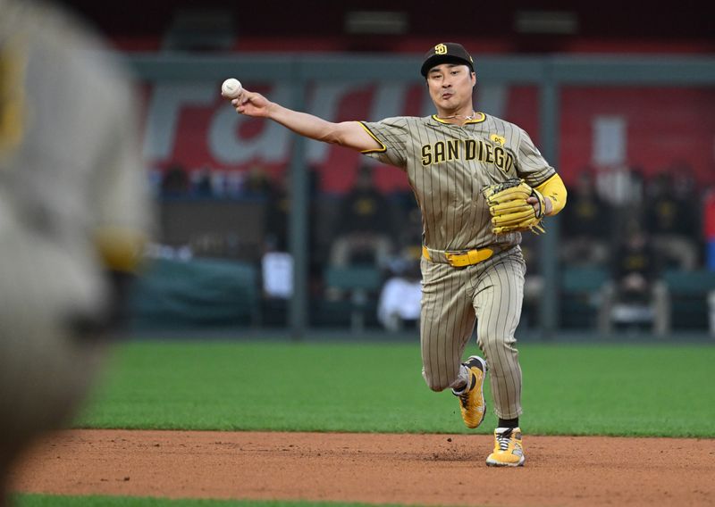 May 31, 2024; Kansas City, Missouri, USA; San Diego Padres shortstop Ha-Seong Kim (7) throws the ball to first base for an out in the third inning against the Kansas City Royals at Kauffman Stadium. Mandatory Credit: Peter Aiken-USA TODAY Sports