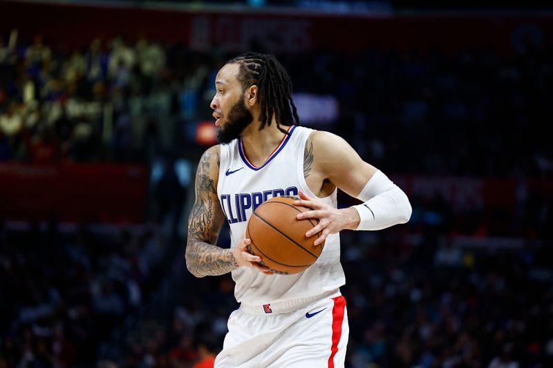 LOS ANGELES, CALIFORNIA - APRIL 14:  Amir Coffey #7 of the LA Clippers in the second half at Crypto.com Arena on April 14, 2024 in Los Angeles, California.  NOTE TO USER: User expressly acknowledges and agrees that, by downloading and/or using this photograph, user is consenting to the terms and conditions of the Getty Images License Agreement.  (Photo by Ronald Martinez/Getty Images)