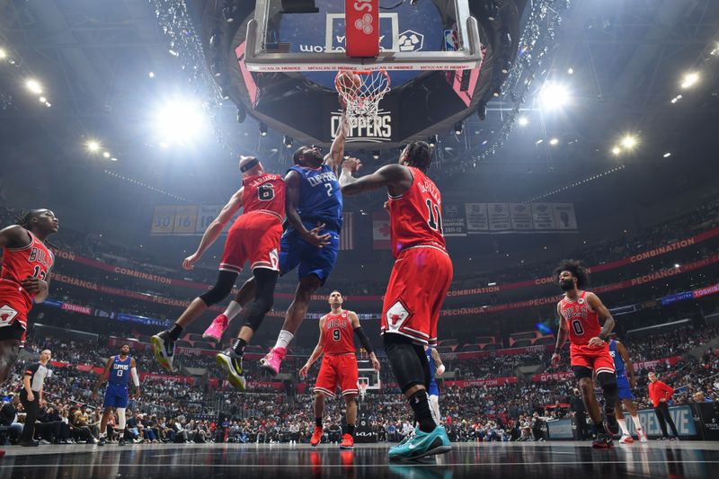 LOS ANGELES, CA - MARCH 9: Kawhi Leonard #2 of the LA Clippers shoots the ball during the game against the Chicago Bulls on March 9, 2024 at Crypto.Com Arena in Los Angeles, California. NOTE TO USER: User expressly acknowledges and agrees that, by downloading and/or using this Photograph, user is consenting to the terms and conditions of the Getty Images License Agreement. Mandatory Copyright Notice: Copyright 2024 NBAE (Photo by Adam Pantozzi/NBAE via Getty Images)