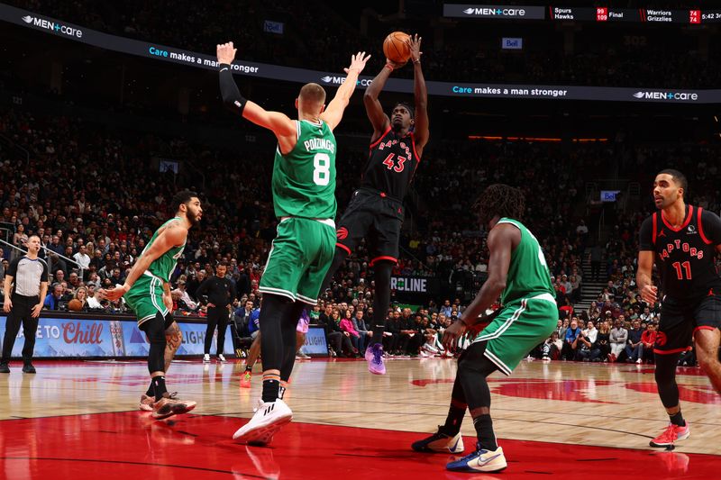 TORONTO, CANADA - JANUARY 15:  Pascal Siakam #43 of the Toronto Raptors shoots the ball during the game against the Boston Celtics on January 15, 2024 at the Scotiabank Arena in Toronto, Ontario, Canada.  NOTE TO USER: User expressly acknowledges and agrees that, by downloading and or using this Photograph, user is consenting to the terms and conditions of the Getty Images License Agreement.  Mandatory Copyright Notice: Copyright 2024 NBAE (Photo by Vaughn Ridley/NBAE via Getty Images)