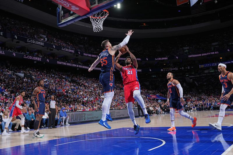 PHILADELPHIA, PA - APRIL 28: Joel Embiid #21 of the Philadelphia 76ers drives to the basket during the game against the New York Knicks during Round 1 Game 4 of the 2024 NBA Playoffs on April 28, 2024 at the Wells Fargo Center in Philadelphia, Pennsylvania NOTE TO USER: User expressly acknowledges and agrees that, by downloading and/or using this Photograph, user is consenting to the terms and conditions of the Getty Images License Agreement. Mandatory Copyright Notice: Copyright 2024 NBAE (Photo by Jesse D. Garrabrant/NBAE via Getty Images)