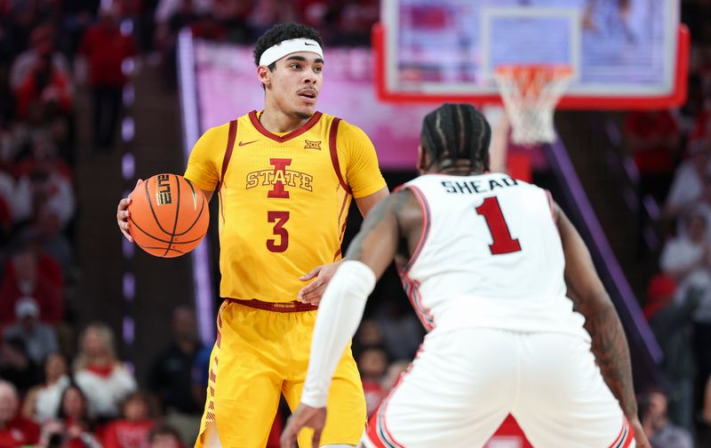 Feb 19, 2024; Houston, Texas, USA; Iowa State Cyclones guard Tamin Lipsey (3) controls the ball as Houston Cougars guard Jamal Shead (1) defends during the first half at Fertitta Center. Mandatory Credit: Troy Taormina-USA TODAY Sports