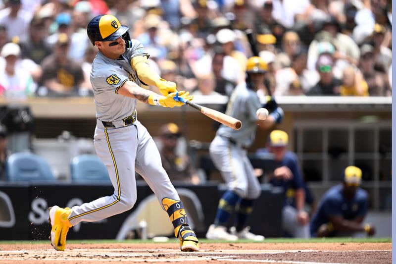 Jun 23, 2024; San Diego, California, USA; Milwaukee Brewers third baseman Joey Ortiz (3) hits a single against the San Diego Padres during the second inning at Petco Park. Mandatory Credit: Orlando Ramirez-USA TODAY Sports