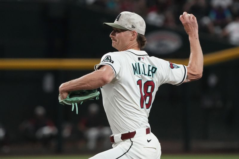 May 18, 2025; Phoenix, Arizona, USA; Arizona Diamondbacks pitcher Shelby Miller (18) throws against the Colorado Rockies in the ninth inning at Chase Field. Mandatory Credit: Rick Scuteri-Imagn Images