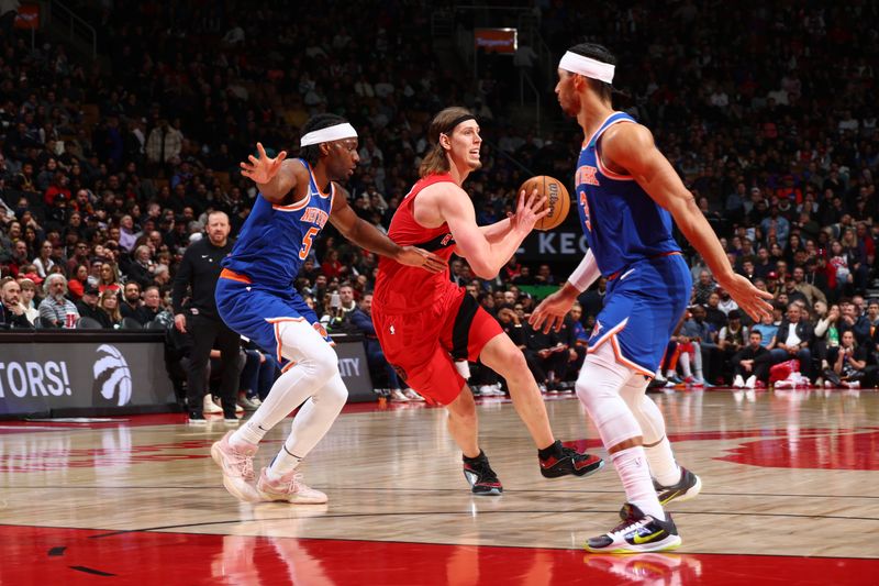 TORONTO, CANADA - MARCH 27: Kelly Olynyk #41 of the Toronto Raptor drives to the basket during the game against the New York Knicks on March 27, 2024 at the Scotiabank Arena in Toronto, Ontario, Canada.  NOTE TO USER: User expressly acknowledges and agrees that, by downloading and or using this Photograph, user is consenting to the terms and conditions of the Getty Images License Agreement.  Mandatory Copyright Notice: Copyright 2024 NBAE (Photo by Vaughn Ridley/NBAE via Getty Images)