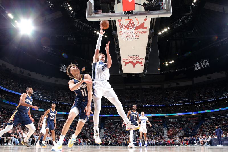 NEW ORLEANS, LA - APRIL 3:  Moritz Wagner #21 of the Orlando Magic drives to the basket during the game against the New Orleans Pelicans on April 3, 2024 at the Smoothie King Center in New Orleans, Louisiana. NOTE TO USER: User expressly acknowledges and agrees that, by downloading and or using this Photograph, user is consenting to the terms and conditions of the Getty Images License Agreement. Mandatory Copyright Notice: Copyright 2024 NBAE (Photo by Layne Murdoch Jr./NBAE via Getty Images)