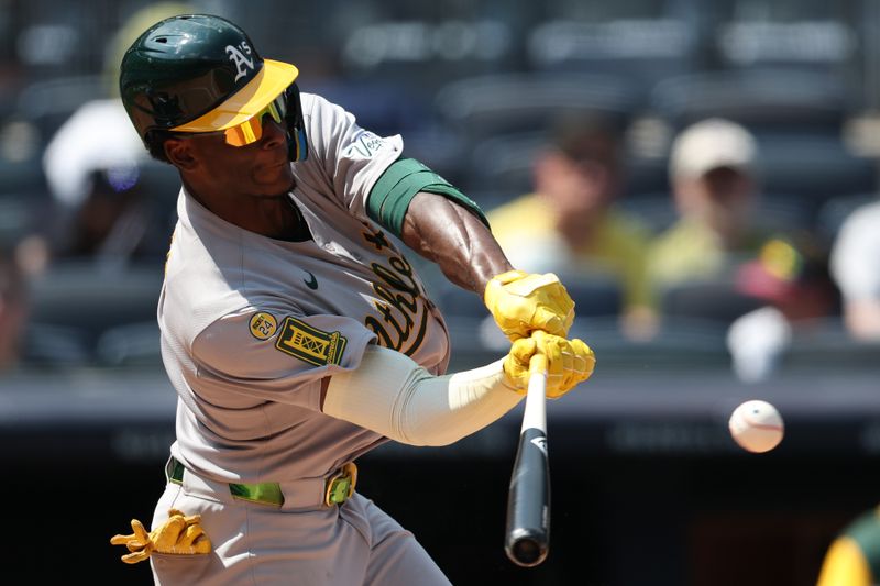 Jun 28, 2025; Bronx, New York, USA; Athletics center fielder Denzel Clarke (1) singles during the seventh inning against the New York Yankees at Yankee Stadium. Mandatory Credit: Vincent Carchietta-Imagn Images