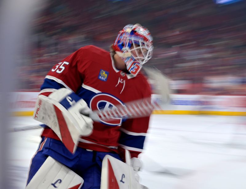 Oct 14, 2025; Montreal, Quebec, CAN; Montreal Canadiens goalie Sam Montembeault (35) skates during the warmup period before the game against the Seattle Kraken at the Bell Centre. Mandatory Credit: Eric Bolte-Imagn Images