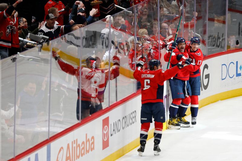 Nov 19, 2025; Washington, District of Columbia, USA; Washington Capitals left wing Alex Ovechkin (8) celebrates with teammates after scoring a goal against the Edmonton Oilers during the first period at Capital One Arena. Mandatory Credit: Geoff Burke-Imagn Images