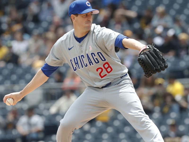 May 12, 2024; Pittsburgh, Pennsylvania, USA;  Chicago Cubs starting pitcher Kyle Hendricks (28) delivers a pitch against the Pittsburgh Pirates during the first inning at PNC Park. Mandatory Credit: Charles LeClaire-USA TODAY Sports