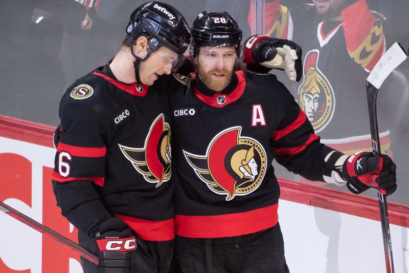 Jan 29, 2024; Ottawa, Ontario, CAN; Ottawa Senators defenseman Jakob Chychrun (6) congratulates right wing Claude Giroux (28) on his overtime goal scored against the Nashville Predators at the Canadian Tire Centre. Mandatory Credit: Marc DesRosiers-USA TODAY Sports