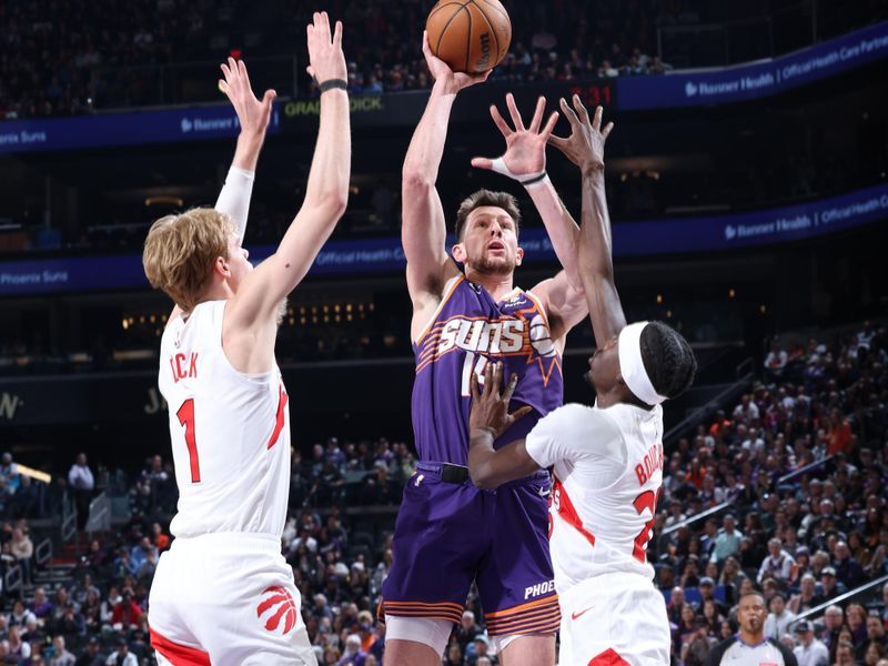 PHOENIX, AZ - MARCH 7: Drew Eubanks #14 of the Phoenix Suns shoots the ball during the game against the Toronto Raptors on March 7, 2024 at Footprint Center in Phoenix, Arizona. NOTE TO USER: User expressly acknowledges and agrees that, by downloading and or using this photograph, user is consenting to the terms and conditions of the Getty Images License Agreement. Mandatory Copyright Notice: Copyright 2024 NBAE (Photo by Jeff Haynes/NBAE via Getty Images)