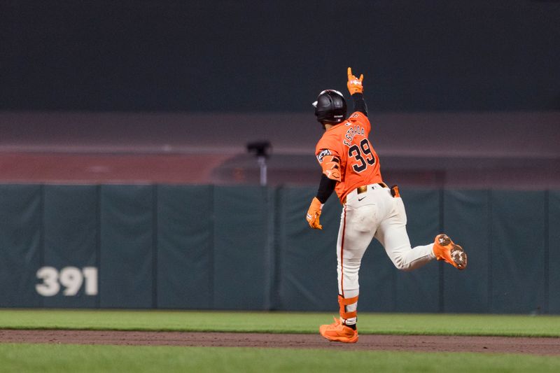 May 17, 2024; San Francisco, California, USA; San Francisco Giants second baseman Thairo Estrada (39) gestures as he runs the bases after hitting a three-run home run against the Colorado Rockies during the fifth inning at Oracle Park. Mandatory Credit: John Hefti-USA TODAY Sports