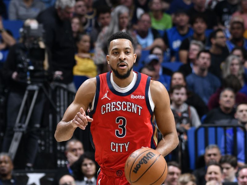 ORLANDO, FL - MARCH 21: CJ McCollum #3 of the New Orleans Pelicans dribbles the ball during the game against the Orlando Magic on March 21, 2024 at Amway Center in Orlando, Florida. NOTE TO USER: User expressly acknowledges and agrees that, by downloading and or using this photograph, User is consenting to the terms and conditions of the Getty Images License Agreement. Mandatory Copyright Notice: Copyright 2024 NBAE (Photo by Fernando Medina/NBAE via Getty Images)