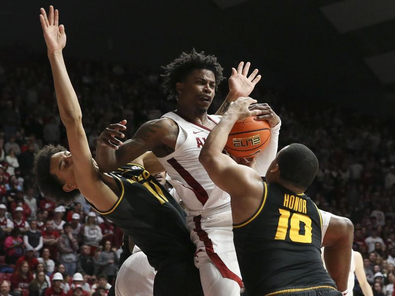 Jan 16, 2024; Tuscaloosa, Alabama, USA; Missouri forward Trent Pierce (11), Alabama guard Latrell Wrightsell Jr. (12) and Missouri guard Nick Honor (10) fight for control of the ball under the basket in the game at Coleman Coliseum. Mandatory Credit: Gary Cosby Jr.-USA TODAY Sports