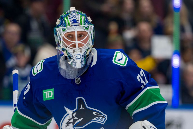 Nov 12, 2024; Vancouver, British Columbia, CAN; Vancouver Canucks goalie Kevin Lankinen (32) warms up prior to a game against the Calgary Flames at Rogers Arena. Mandatory Credit: Bob Frid-Imagn Images