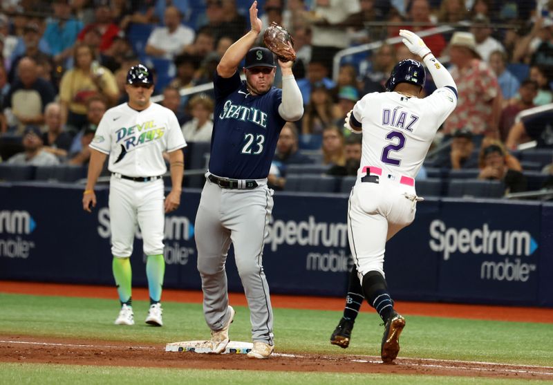 Sep 8, 2023; St. Petersburg, Florida, USA;  Seattle Mariners first baseman Ty France (23) forces out Tampa Bay Rays first baseman Yandy Diaz (2) during the second inning at Tropicana Field. Mandatory Credit: Kim Klement Neitzel-USA TODAY Sports