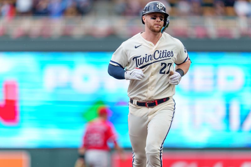 Sep 24, 2023; Minneapolis, Minnesota, USA; Minnesota Twins catcher Ryan Jeffers (27) runs from second to third as he rounds the bases after hitting a home run in the seventh inning against the Los Angeles Angels at Target Field. Mandatory Credit: Matt Blewett-USA TODAY Sports