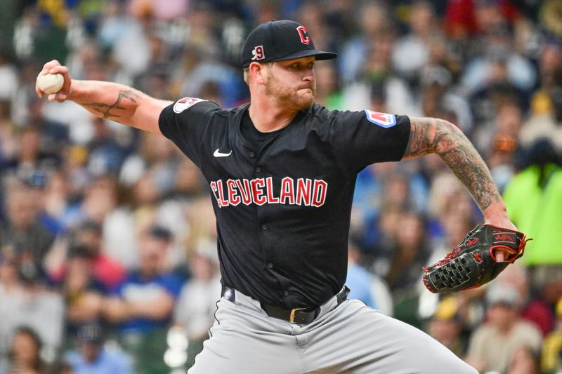 Aug 18, 2024; Milwaukee, Wisconsin, USA; Cleveland Guardians starting pitcher Ben Lively (39) pitches against the Milwaukee Brewers in the first inning at American Family Field. Mandatory Credit: Benny Sieu-USA TODAY Sports