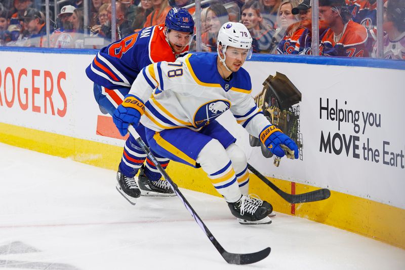 Jan 25, 2025; Edmonton, Alberta, CAN; Buffalo Sabres defensemen Jacob Bryson (78) and Edmonton Oilers forward Zach Hyman (18) chase a loose puck during the third period at Rogers Place. Mandatory Credit: Perry Nelson-Imagn Images