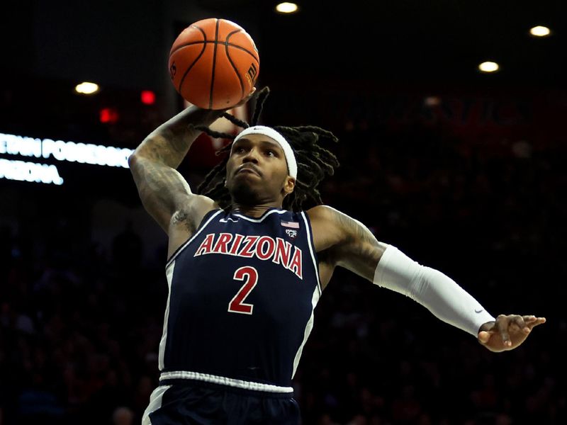 Jan 17, 2024; Tucson, Arizona, USA; Arizona Wildcats guard Caleb Love (2) shoots a basket against the USC Trojans during the second half at McKale Center. Mandatory Credit: Zachary BonDurant-USA TODAY Sports