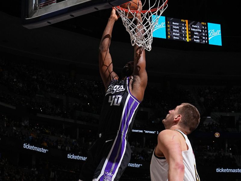 DENVER, CO - FEBRUARY 28: Harrison Barnes #40 of the Sacramento Kings drives to the basket during the game against the Denver Nuggets on February 28, 2024 at the Ball Arena in Denver, Colorado. NOTE TO USER: User expressly acknowledges and agrees that, by downloading and/or using this Photograph, user is consenting to the terms and conditions of the Getty Images License Agreement. Mandatory Copyright Notice: Copyright 2024 NBAE (Photo by Garrett Ellwood/NBAE via Getty Images)