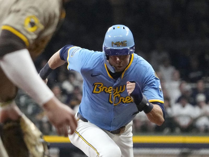 Jun 7, 2025; Milwaukee, Wisconsin, USA; Milwaukee Brewers outfielder Christian Yelich (22) runs to third base against the San Diego Padres in the eighth inning at American Family Field. Mandatory Credit: Michael McLoone-Imagn Images