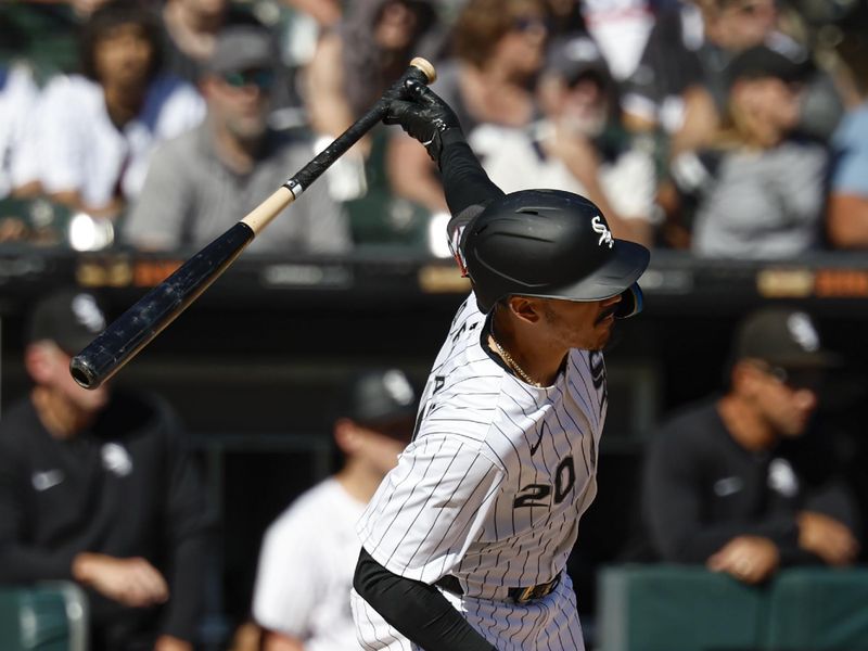 Sep 26, 2024; Chicago, Illinois, USA; Chicago White Sox outfielder Miguel Vargas (20) grounds into a force out against the Los Angeles Angels during the fifth inning at Guaranteed Rate Field. Mandatory Credit: Kamil Krzaczynski-Imagn Images