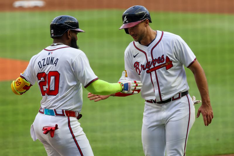 May 8, 2024; Atlanta, Georgia, USA; Atlanta Braves designated hitter Marcell Ozuna (20) celebrates after a three-run home run with first baseman Matt Olson (28) against the Boston Red Sox in the first inning at Truist Park. Mandatory Credit: Brett Davis-USA TODAY Sports
