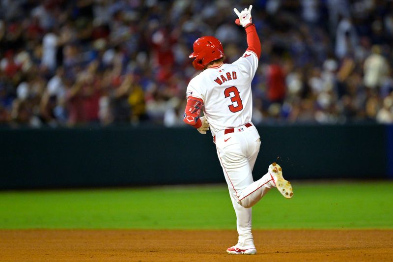 Sep 4, 2024; Anaheim, California, USA; Los Angeles Angels left fielder Taylor Ward (3) rounds the bases on a solo home run in the fifth inning against the Los Angeles Dodgers at Angel Stadium. Mandatory Credit: Jayne Kamin-Oncea-Imagn Images