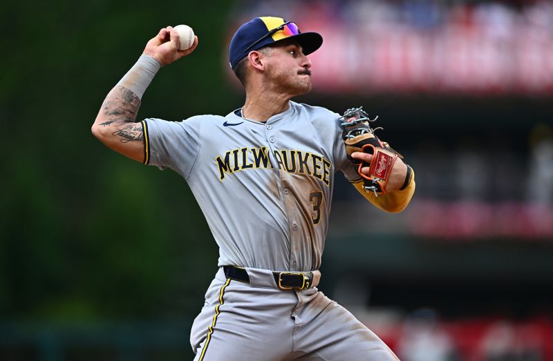 Jun 5, 2024; Philadelphia, Pennsylvania, USA; Milwaukee Brewers third baseman Joey Ortiz (3) throws to first base against the Philadelphia Phillies in the fourth inning at Citizens Bank Park. Mandatory Credit: Kyle Ross-USA TODAY Sports