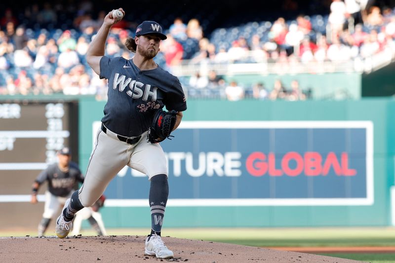 Jun 7, 2024; Washington, District of Columbia, USA; Washington Nationals starting pitcher Jake Irvin (27) pitches against the Atlanta Braves during the first inning at Nationals Park. Mandatory Credit: Geoff Burke-USA TODAY Sports