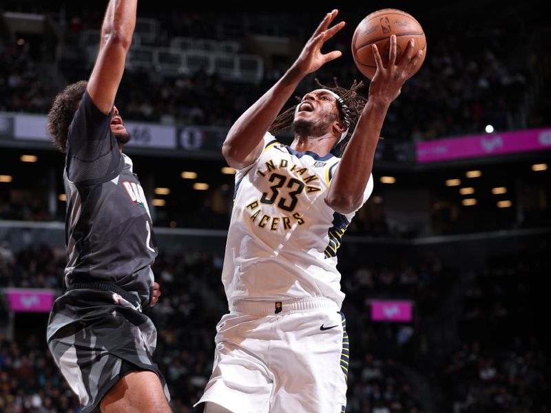 BROOKLYN, NY - DECEMBER 4: Myles Turner #33 of the Indiana Pacers drives to the basket during the game against the Brooklyn Nets on December 4, 2024 at Barclays Center in Brooklyn, New York. NOTE TO USER: User expressly acknowledges and agrees that, by downloading and or using this Photograph, user is consenting to the terms and conditions of the Getty Images License Agreement. Mandatory Copyright Notice: Copyright 2024 NBAE (Photo by Jeff Haynes/NBAE via Getty Images)