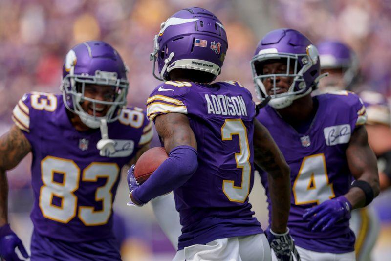 Minnesota Vikings wide receiver Jordan Addison (3) celebrates with teammates after scoring a touchdown against the Tampa Bay Buccaneers during the first half of an NFL football game Sunday, Sept. 9, 2023 in Minneapolis. (AP Photo/Stacy Bengs)