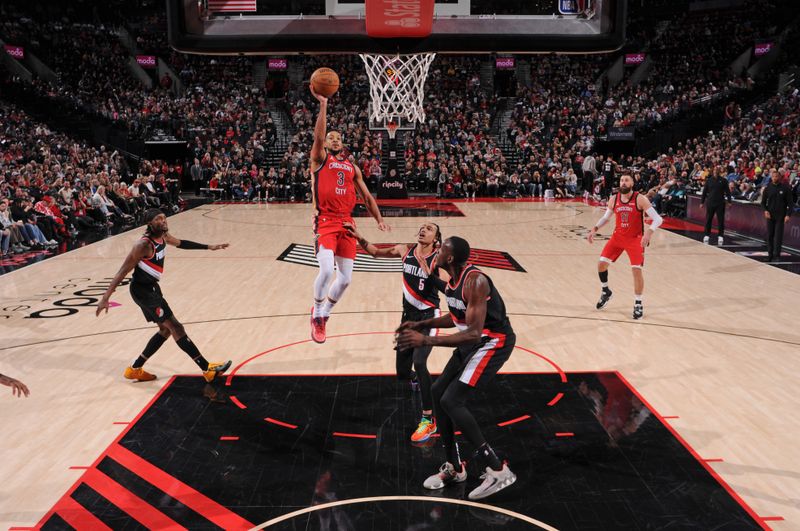 PORTLAND, OR - FEBRUARY 10: CJ McCollum #3 of the New Orleans Pelicans shoots the ball during the game against the Portland Trail Blazers on February 10, 2024 at the Moda Center Arena in Portland, Oregon. NOTE TO USER: User expressly acknowledges and agrees that, by downloading and or using this photograph, user is consenting to the terms and conditions of the Getty Images License Agreement. Mandatory Copyright Notice: Copyright 2024 NBAE (Photo by Cameron Browne/NBAE via Getty Images)