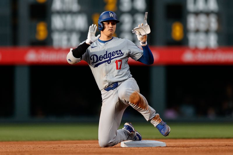 Jun 17, 2024; Denver, Colorado, USA; Los Angeles Dodgers designated hitter Shohei Ohtani (17) gestures after hitting a double in the fourth inning against the Colorado Rockies at Coors Field. Mandatory Credit: Isaiah J. Downing-USA TODAY Sports