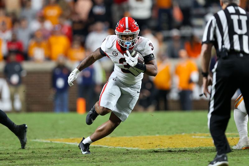 Nov 18, 2023; Knoxville, Tennessee, USA; Georgia Bulldogs running back Andrew Paul (3) runs the ball against the Tennessee Volunteers during the second half at Neyland Stadium. Mandatory Credit: Randy Sartin-USA TODAY Sports