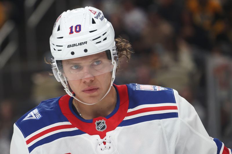 Oct 11, 2025; Pittsburgh, Pennsylvania, USA;  New York Rangers left wing Artemi Panarin (10) looks on against the Pittsburgh Penguins during the third period at PPG Paints Arena. Mandatory Credit: Charles LeClaire-Imagn Images