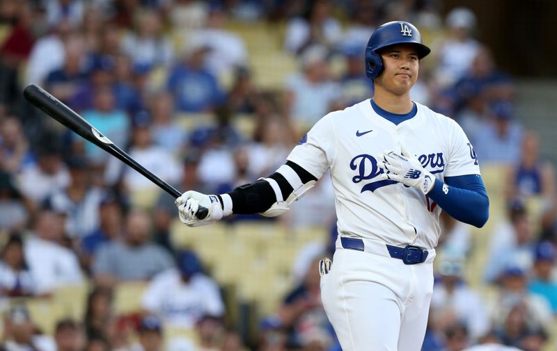 Jul 23, 2024; Los Angeles, California, USA; Los Angeles Dodgers designated hitter Shohei Ohtani (17) prepares to bat during the first inning against the San Francisco Giants at Dodger Stadium. Mandatory Credit: Jason Parkhurst-USA TODAY Sports