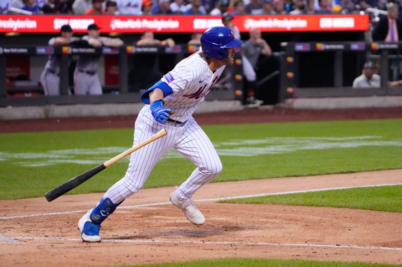 Jul 2, 2023; New York City, New York, USA; New York Mets second baseman Jeff McNeil (1) hits an RBI infield single against the San Francisco Gianes during the third inning at Citi Field. Mandatory Credit: Gregory Fisher-USA TODAY Sports