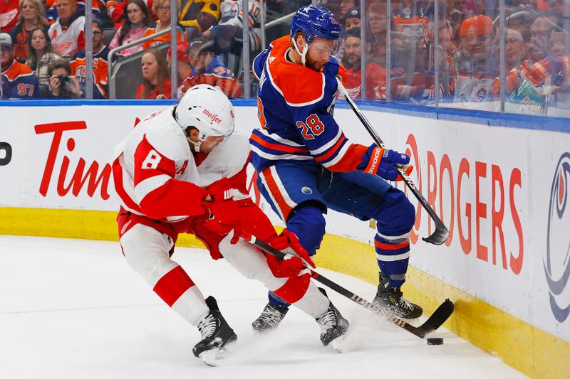 Feb 13, 2024; Edmonton, Alberta, CAN; Edmonton Oilers forward Connor Brown (28) and Detroit Red Wings defensemen Ben Chiarot (8) Battle along the boards for a loose puck  during the first period at Rogers Place. Mandatory Credit: Perry Nelson-USA TODAY Sports