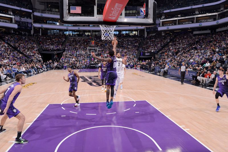 SACRAMENTO, CA - JANUARY 7:  CJ McCollum #3 of the New Orleans Pelicans goes to the basket during the game on January 7, 2024 at Golden 1 Center in Sacramento, California. NOTE TO USER: User expressly acknowledges and agrees that, by downloading and or using this Photograph, user is consenting to the terms and conditions of the Getty Images License Agreement. Mandatory Copyright Notice: Copyright 2024 NBAE (Photo by Rocky Widner/NBAE via Getty Images)