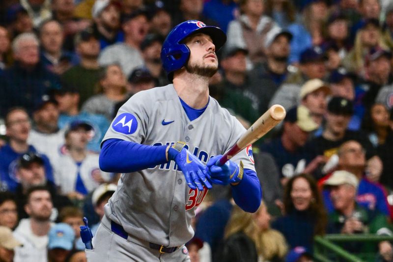 May 3, 2025; Milwaukee, Wisconsin, USA; Chicago Cubs right fielder Kyle Tucker (30) hits a solo home run in the fifth inning against the Milwaukee Brewers at American Family Field. Mandatory Credit: Benny Sieu-Imagn Images