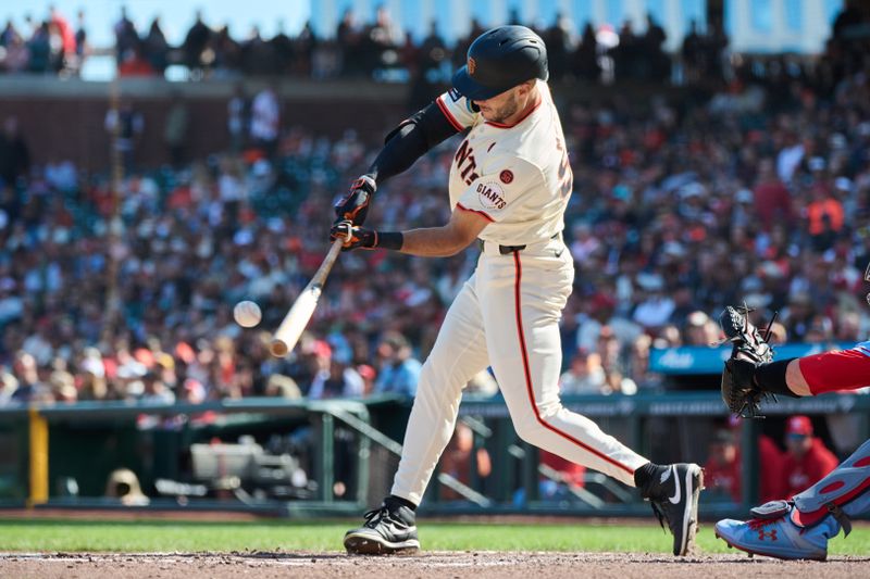 Sep 28, 2024; San Francisco, California, USA; San Francisco Giants outfielder Grant McCray (58) hits an infield single against the St. Louis Cardinals during the sixth inning at Oracle Park. Mandatory Credit: Robert Edwards-Imagn Images