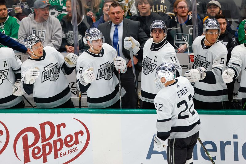 Mar 16, 2024; Dallas, Texas, USA; Los Angeles Kings left wing Kevin Fiala (22) is congratulated by teammates after scoring in the 3rd period against the Dallas Stars at American Airlines Center. Mandatory Credit: Andrew Dieb-USA TODAY Sports