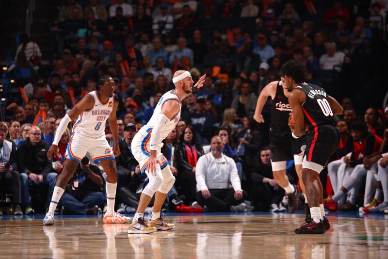 OKLAHOMA CITY, OK - NOVEMBER 20: Alex Caruso #9 of the Oklahoma City Thunder plays defense during the game against the Portland Trail Blazers on November 20, 2024 at Paycom Center in Oklahoma City, Oklahoma. NOTE TO USER: User expressly acknowledges and agrees that, by downloading and or using this photograph, User is consenting to the terms and conditions of the Getty Images License Agreement. Mandatory Copyright Notice: Copyright 2024 NBAE (Photo by Zach Beeker/NBAE via Getty Images)