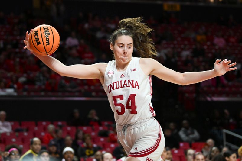 Jan 31, 2024; College Park, Maryland, USA;  Indiana Hoosiers forward Mackenzie Holmes (54) reaches for loose ball during the first half against the Maryland Terrapins at Xfinity Center. Mandatory Credit: Tommy Gilligan-USA TODAY Sports