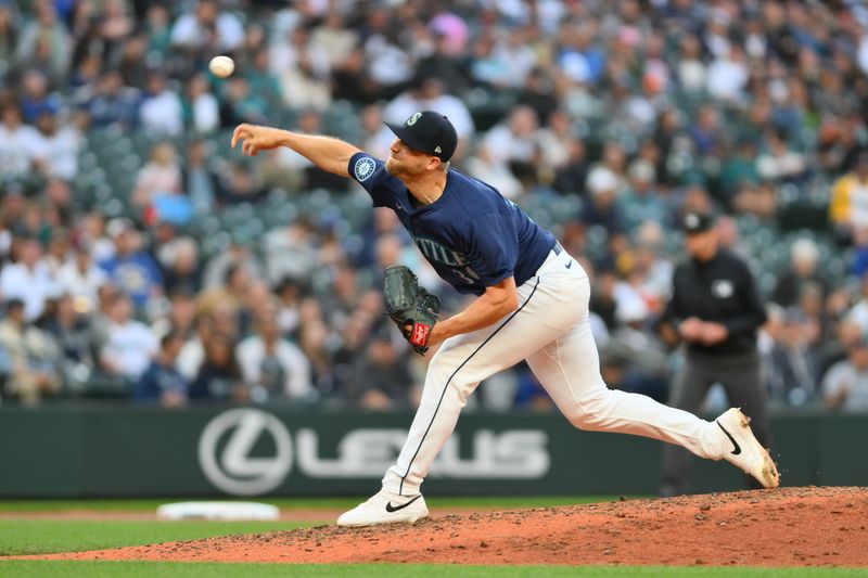 Jun 13, 2024; Seattle, Washington, USA; Seattle Mariners relief pitcher Austin Voth (30) pitches to the Chicago White Sox during the eighth inning at T-Mobile Park. Mandatory Credit: Steven Bisig-USA TODAY Sports